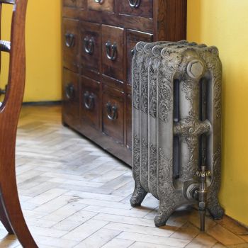 Bodleian ornate cast iron radiator in antiqued pewter finish with Temple thermostatic valves.