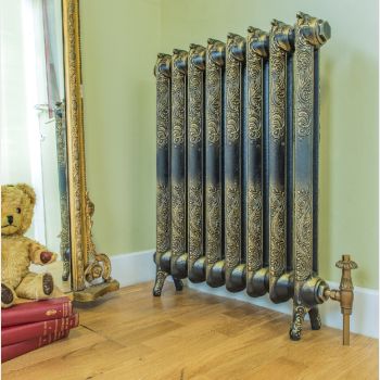 Rococo ornate cast iron radiator in burnished gold finish